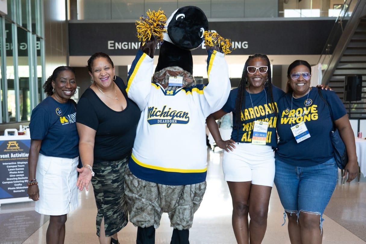 Attendees at UM-Dearborn Alumni & Family Picnic with Bruce the Goose