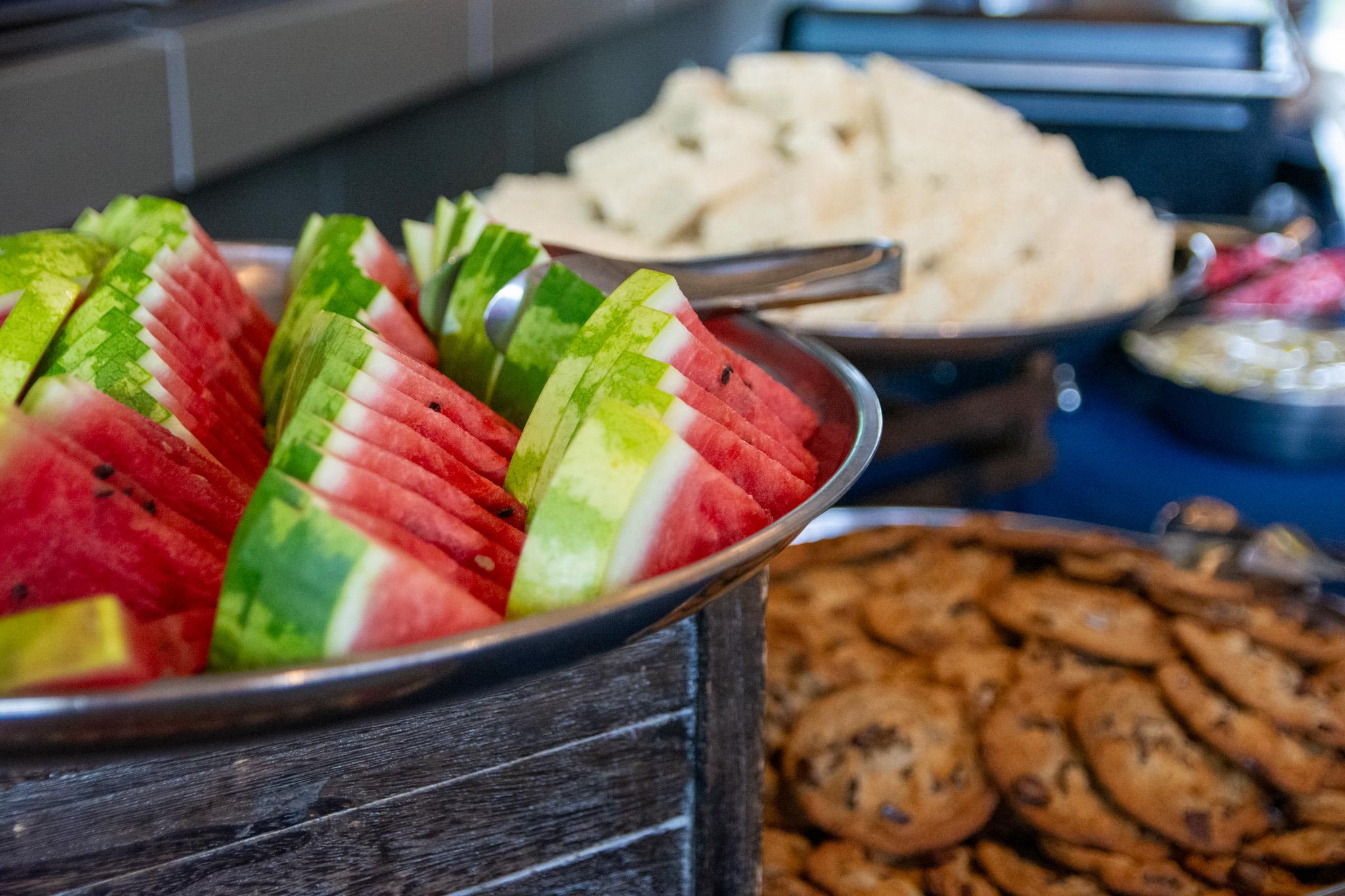 Watermelon, cookies and snacks
