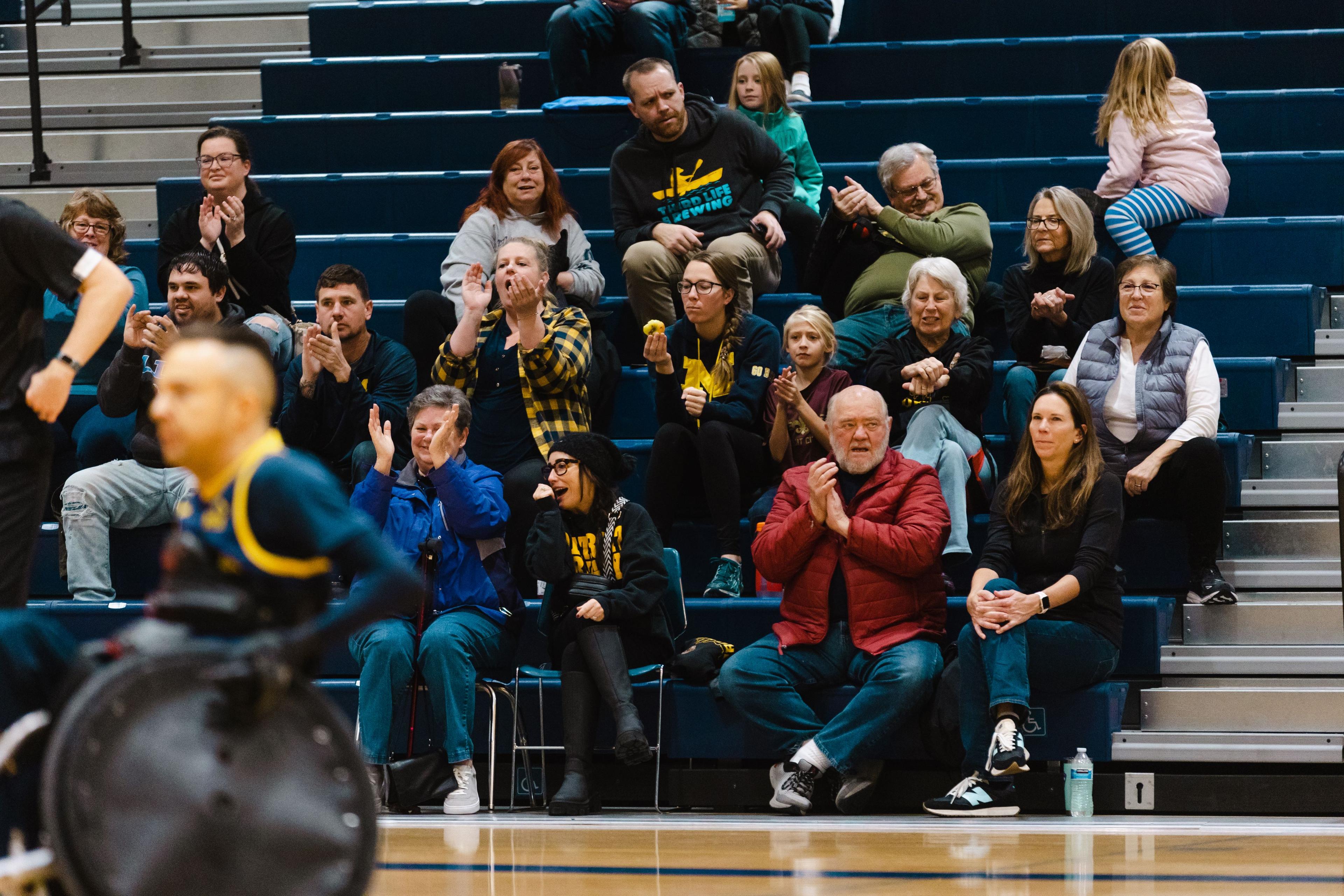 A photo of the crowd from the 2023 Coupie Classic showing people cheering